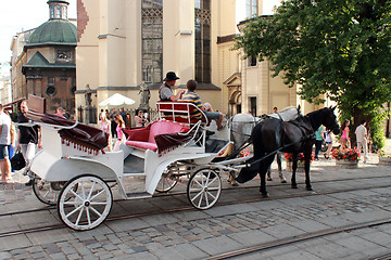 Image showing promenade coach with two harnessed horses in Lvov