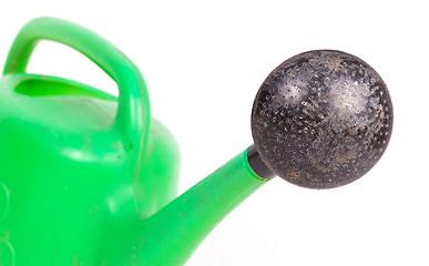 Image showing Green old plastic watering can