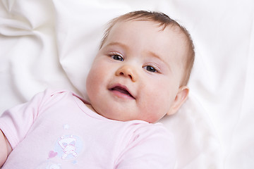 Image showing Baby girl looks into the camera