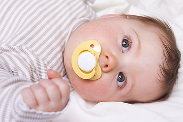 Image showing Baby girl looks into the camera