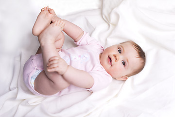 Image showing Baby girl looks into the camera