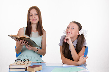 Image showing Trainee teacher listens with interest