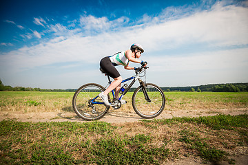 Image showing Women on bike