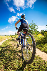 Image showing Women on bike