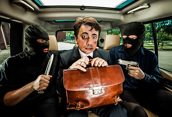 Image showing businessman grasped in hostages.