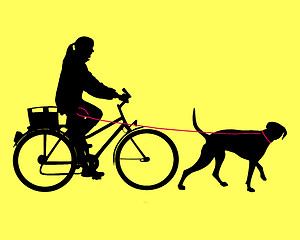 Image showing Woman on bicycle with dog on leash