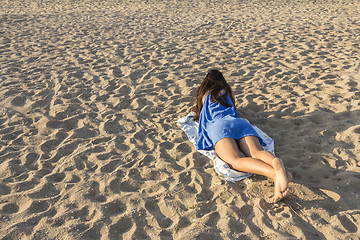 Image showing Girl on a sandy beach 