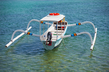 Image showing Balinese traditional boat with motor - double outrigger jukung