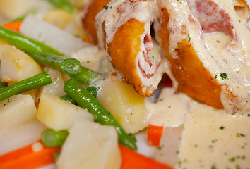 Image showing Chicken Cordon Bleu with boiled potatoes and vegetables