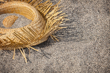 Image showing Tourists went home. Hat lying on the beach - rubbish