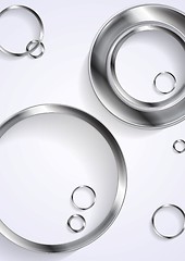 Image showing Metallic circles on white background