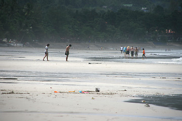 Image showing walking on the beach