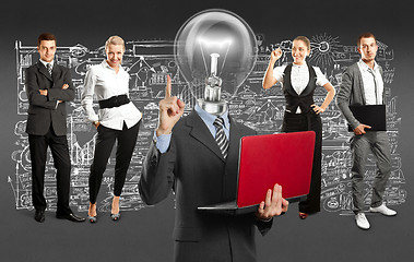 Image showing Business Team With Lamp Head