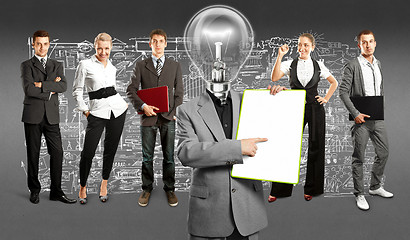 Image showing Business Team With Lamp Head