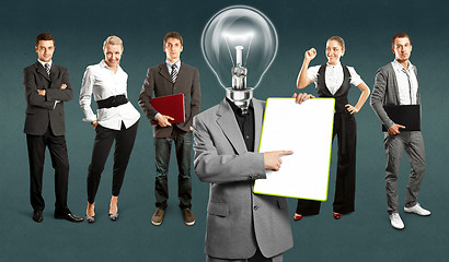 Image showing Business Team With Lamp Head
