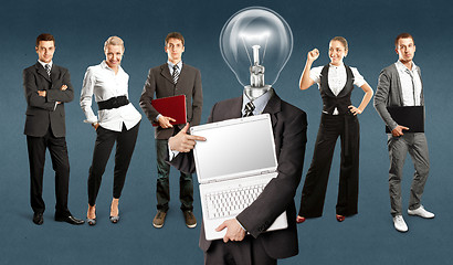 Image showing Business Team With Lamp Head