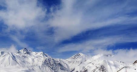 Image showing Winter snowy mountains in fog