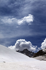 Image showing Rocks with clouds and snowy plateau