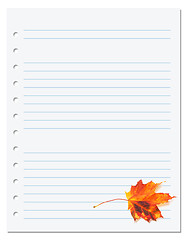 Image showing Notebook paper with autumn orange maple leaf on white