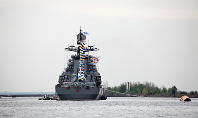 Image showing warship at the pier with flags