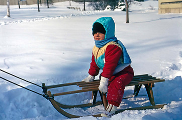 Image showing Boy on sledge