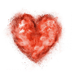 Image showing red heart made of black powder explosion isolated on white