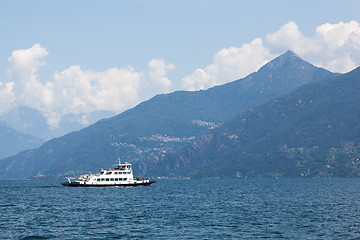 Image showing Boat against mountains on Lake Como