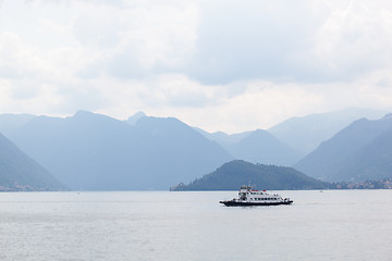 Image showing Boat against mountains on Lake Como