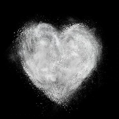 Image showing heart made of white powder explosion isolated on black