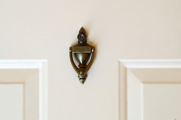 Image showing brass door knocker with peep hole