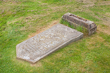 Image showing Very old broken gravestone in the cemetery