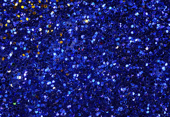 Image showing Small blue glitter as a background