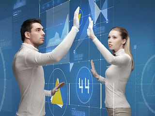 Image showing man and woman working with virtual screen