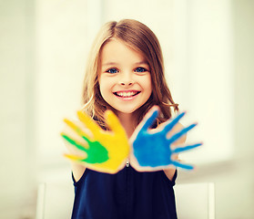 Image showing girl showing painted hands