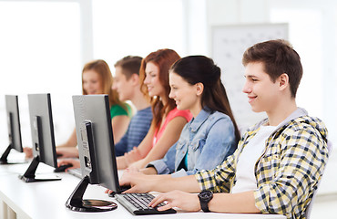 Image showing male student with classmates in computer class