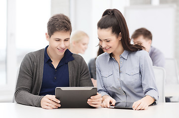 Image showing students looking at tablet pc in lecture at school