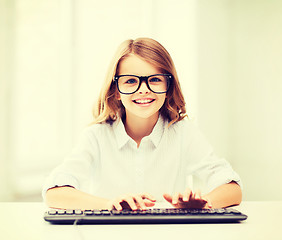 Image showing student girl with keyboard