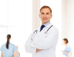 Image showing smiling male doctor with stethoscope