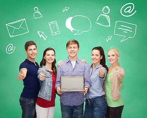 Image showing smiling students with laptop showing thumbs up