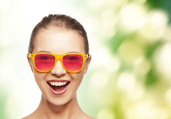 Image showing happy teenage girl in pink sunglasses