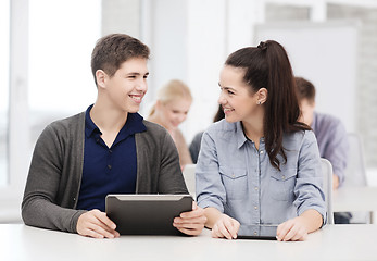 Image showing students looking at tablet pc in lecture at school