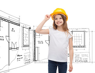 Image showing smiling little girl in helmet and white t-shirt