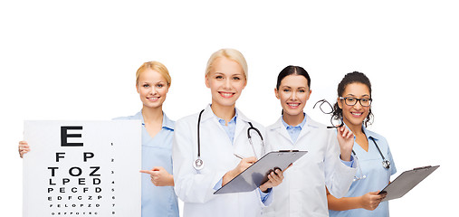 Image showing smiling female eye doctors and nurses