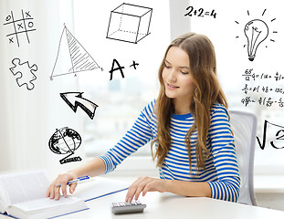 Image showing student girl with book, notebook and calculator