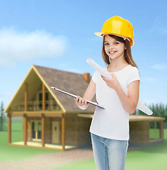 Image showing smiling little girl in protective helmet