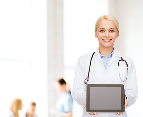 Image showing female doctor with stethoscope and tablet pc