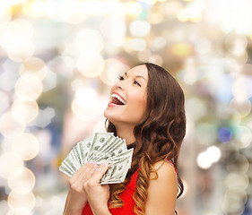 Image showing woman in red dress with us dollar money