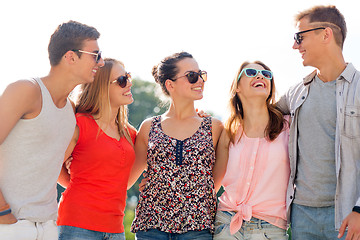 Image showing group of smiling friends in city