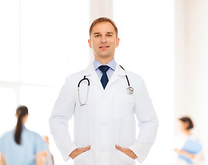 Image showing smiling male doctor with stethoscope