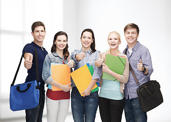 Image showing group of smiling students showing thumbs up